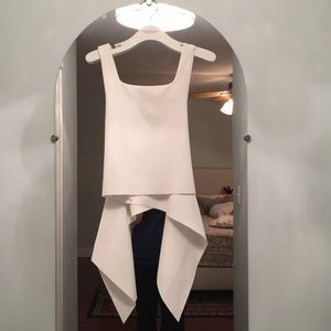 White crop top with bow details in the back